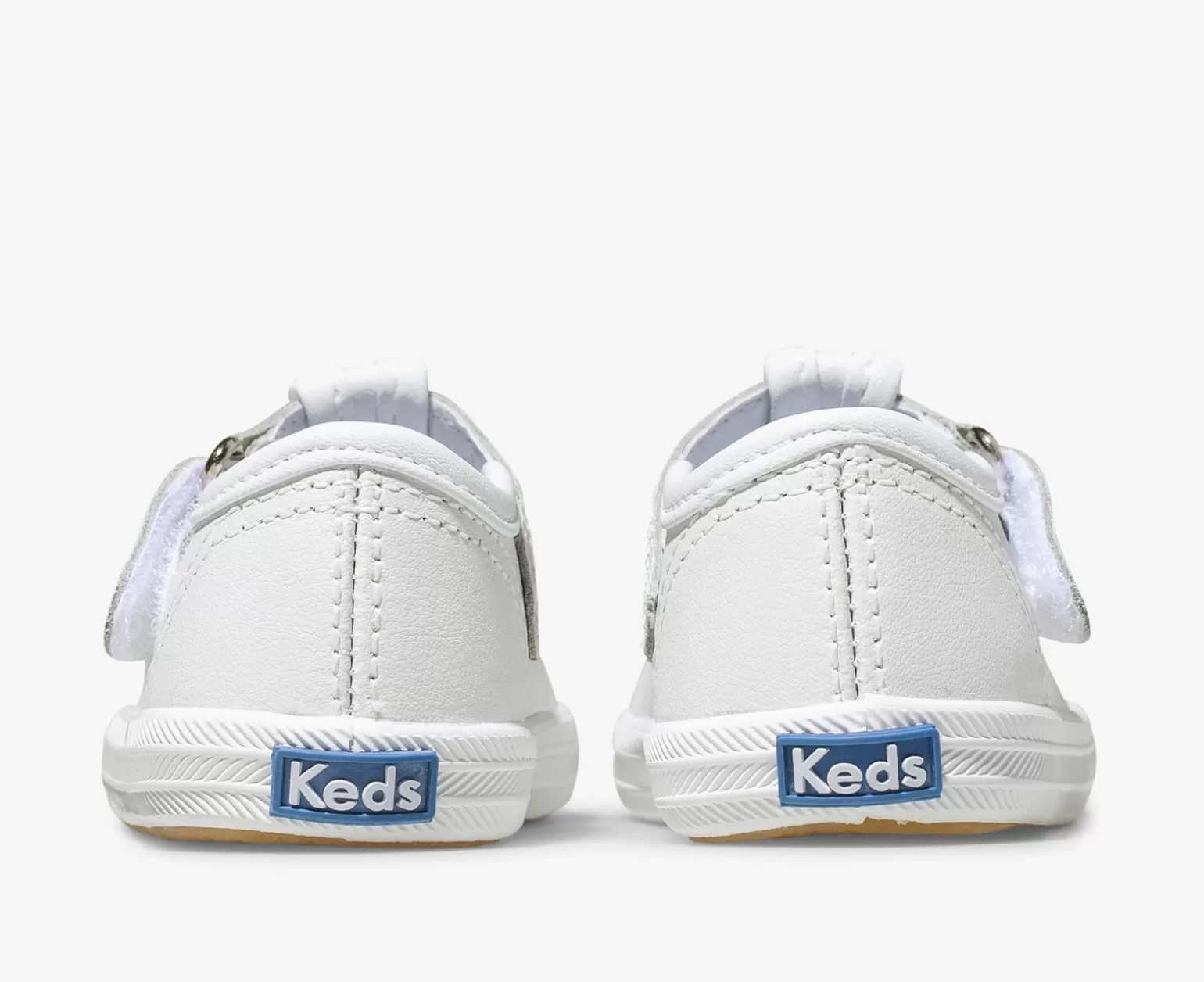 Zapatillas Keds Champion para niñas - Diseño con puntera reforzada y correa en T en cuero blanco (Talla pequeña)
