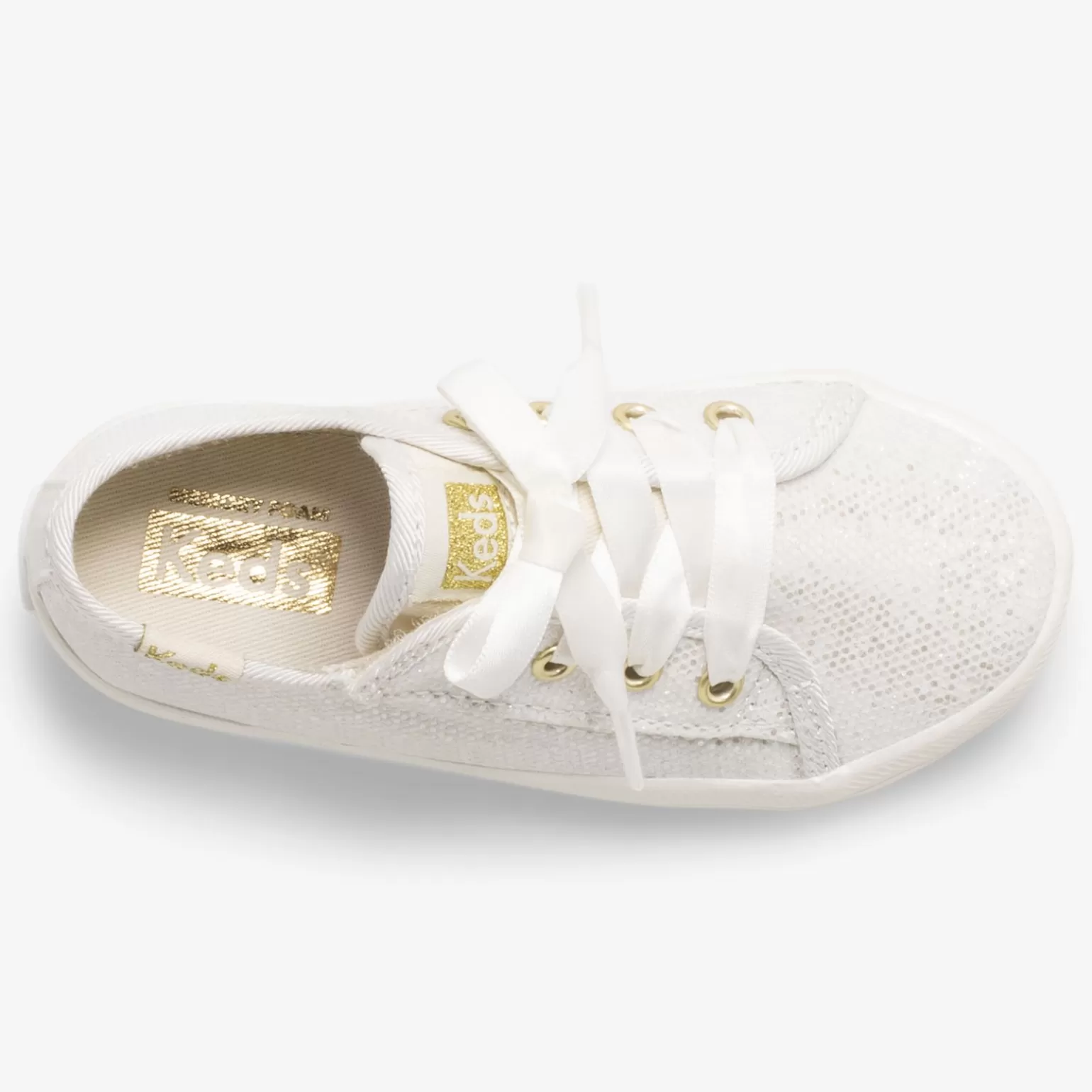 Keds Zapatillas Festivas Infantiles para Niña - Modelo Celebrations Jr. Kickstart en Marfil Brillante con Detalles Relucientes